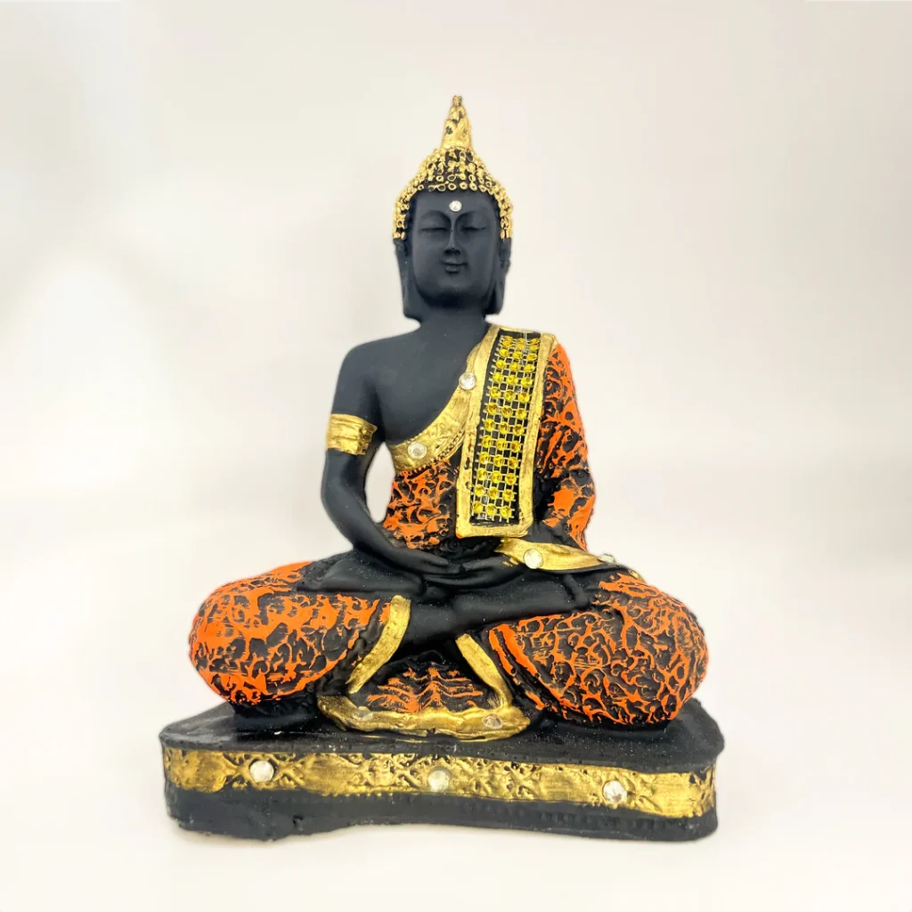 Introducing the "Lord Buddha Sitting Statue," a stunning piece of art crafted from durable polyresin and finished in an elegant black and orange color scheme.