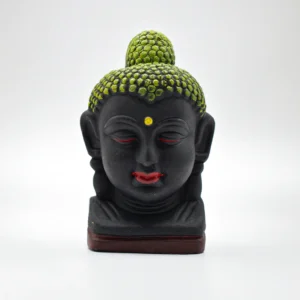 A beautifully handcrafted clay sculpture depicting the serene visage of Buddha.