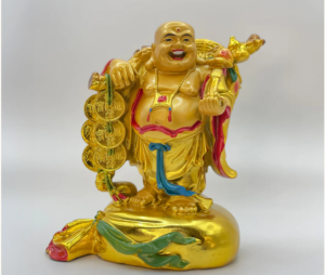 laughing buddha with coins at Tanutra