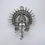 Home decor Silver Radiance Ganesha”—a wall hanging that is as beautiful as it is spiritually uplifting. Made with meticulous craftsmanship, this piece is perfect for those looking to infuse their spaces with divine energy while adding a touch of sophistication.