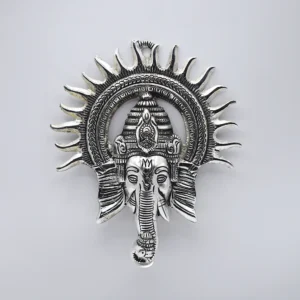 Home decor Silver Radiance Ganesha”—a wall hanging that is as beautiful as it is spiritually uplifting. Made with meticulous craftsmanship, this piece is perfect for those looking to infuse their spaces with divine energy while adding a touch of sophistication.